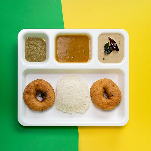 South Indian breakfast with two vadas and one soft idly served with chutney and sambar