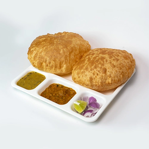 Fluffy poori served with curry