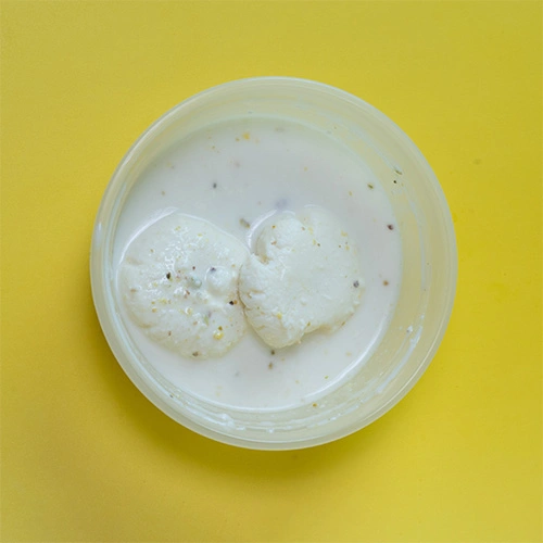Sweet and creamy rasmalai soaked in saffron milk