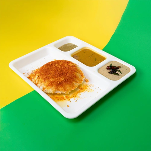 South Indian thatte ghee podi idly served with chutney and sambar