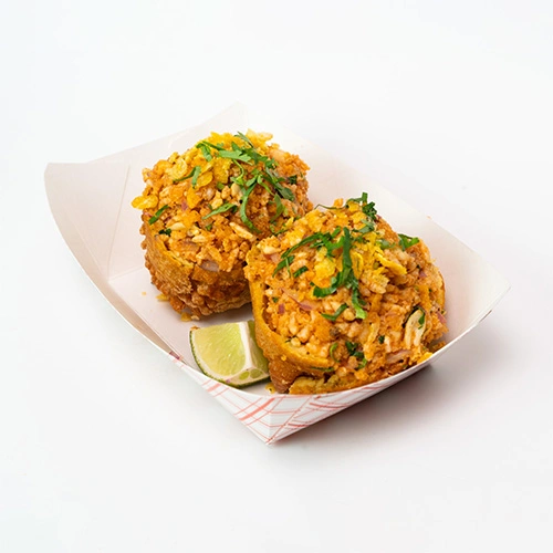 Crispy tomato bajji served with tamarind chutney