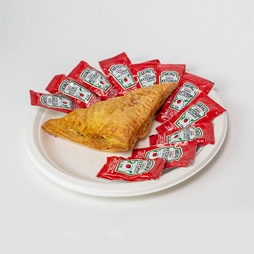 South Indian veg puff served with chutney and sambar